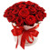 красные розы в шляпной коробке. Индия